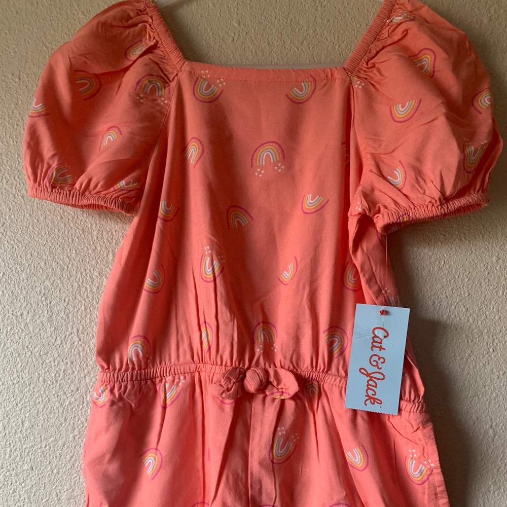 Rainbow romper with tags